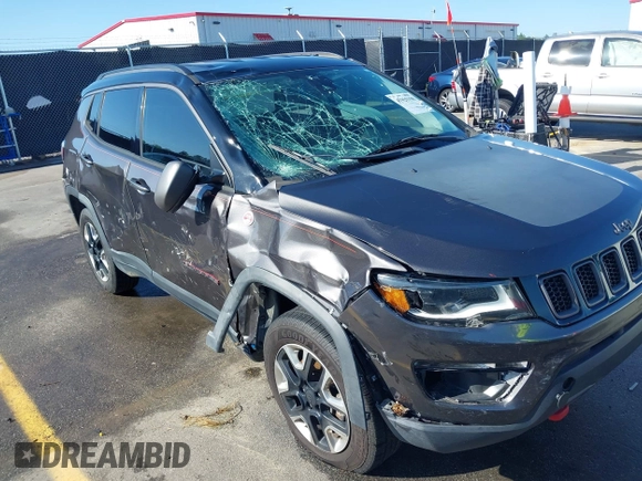 2018 Jeep Compass Trailhawk with VIN 3C4NJDDB3JT231923, listed as a IAAI auction lot 41929198 with 129,001 mi miles and . Bid and sale history available at carsss.com. Image 6.