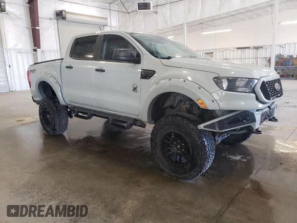 2021 Ford Ranger XL with VIN 1FTER4FH2MLD97098, listed as a Copart auction lot 56696975 with 21,565 mi miles and Salvage title. Bid and sale history available at DreamBid. Image 4.