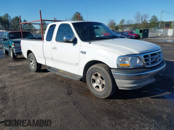 2000 Ford F-150 XL with VIN 1FTZX172XYNB36456, listed as a IAAI auction lot 41554603 with 239,766 mi miles. Bid and sale history available at carsss.com. Image 1.