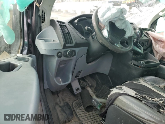 2018 Ford Transit z VIN 1FTYR2CM5JKB49173, wystawiony jako Copart lot #48511685 z przebiegiem Nie podano mil oraz Nie do naprawy. Historia ofert i sprzedaży dostępna na DreamBid. Obrazek 8.