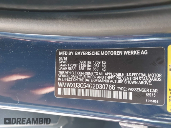 2016 MINI Cooper Hardtop 4 Door S with VIN WMWXU3C54G2D30766, listed as a IAAI auction lot 42008026 with 101,898 mi miles. Bid and sale history available at carsss.com. Image 9.