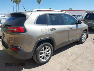 2017 Jeep Cherokee Latitude with VIN 1C4PJLCB8HW667384, listed as a IAAI auction lot 42047427 with 103,339 mi miles and . Bid and sale history available at carsss.com. Image 4.