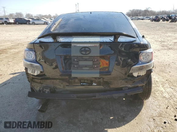 2016 Scion tC z VIN JTKJF5C79GJ014274, wystawiony jako Copart lot #49000685 z przebiegiem 83 607 mil mil oraz Szkoda całkowita • Salvage title. Historia ofert i sprzedaży dostępna na DreamBid. Obrazek 6.