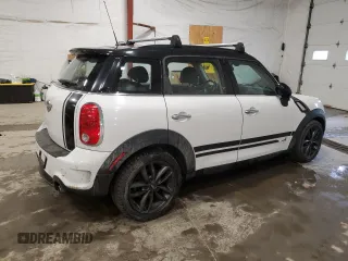 2013 MINI Countryman S ALL4 with VIN WMWZC5C56DWM15763, listed as a Copart auction lot 51165565 with 165,494 mi miles and Salvage Title. Bid and sale history available at DreamBid. Image 3.