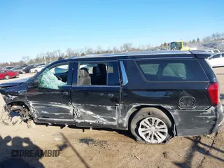 2023 GMC Yukon XL SLT z VIN 1GKS2GKT9PR208083, wystawiony jako IAAI lot #41285870 z przebiegiem 69 901 mil mil oraz . Historia ofert i sprzedaży dostępna na DreamBid. Obrazek 14.