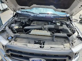 2021 Ford F-150 XL with VIN 1FTFW1E84MKD35382, listed as a Copart auction lot 63413675 with Not provided miles and Salvage title. Bid and sale history available at DreamBid. Image 11.