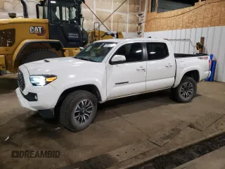 2023 Toyota Tacoma SR with VIN 3TMCZ5AN1PM609812, listed as a Copart auction lot 60061965 with 18,474 mi miles and Salvage title. Bid and sale history available at DreamBid. Image 1.