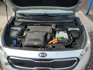 2017 Kia Niro Touring with VIN KNDCE3LC2H5038009, listed as a Copart auction lot 56413204 with 103,656 mi miles and Salvage Title. Bid and sale history available at carsss.com. Image 12.