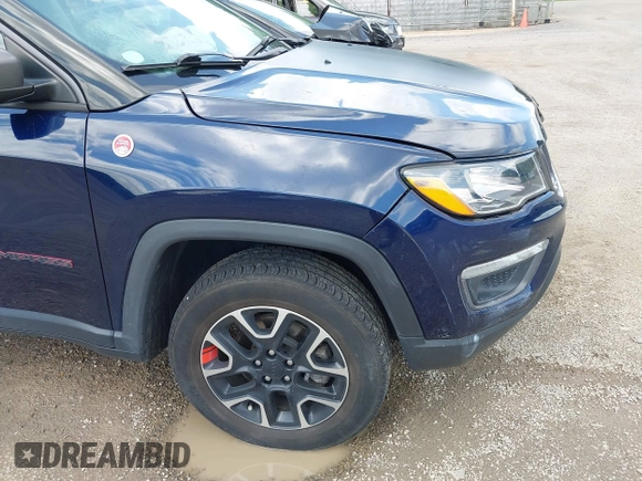 2021 Jeep Compass Trailhawk with VIN 3C4NJDDB0MT590442, listed as a IAAI auction lot 42543530 with 66,669 mi miles and . Bid and sale history available at DreamBid. Image 17.