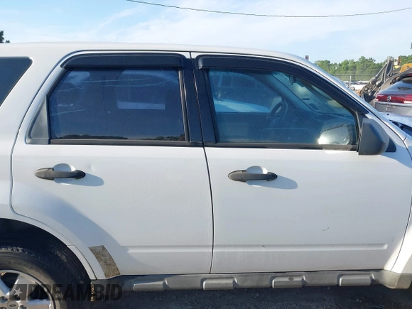 2009 Ford Escape XLS with VIN 1FMCU027X9KC79854, listed as a IAAI auction lot 42131142 with Not provided miles and . Bid and sale history available at DreamBid. Image 12.