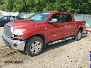 2012 Toyota Tundra with VIN 5TFEY5F18CX129014, listed as a Copart auction lot 63482095 with 128,002 mi miles and Salvage title. Bid and sale history available at DreamBid. Image 1.