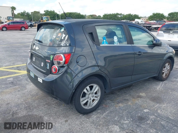 2014 Chevrolet Sonic LT with VIN 1G1JC6SB2E4115463, listed as a IAAI auction lot 42106600 with 135,652 mi miles. Bid and sale history available at carsss.com. Image 4.