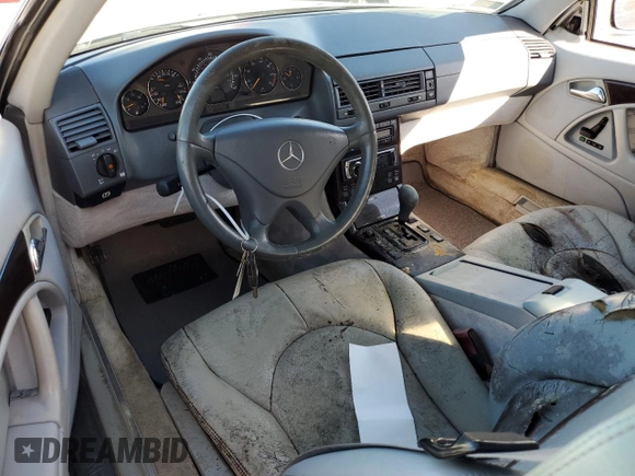 1999 Mercedes-Benz SL-Class with VIN WDBFA68F0XF176572, listed as a Copart auction lot 74715254 with 0 mi miles and Salvage Title. Bid and sale history available at carsss.com. Image 8.