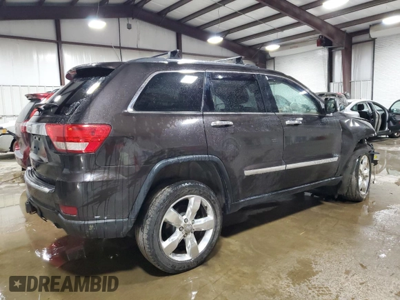 2013 Jeep Grand Cherokee Overland with VIN 1C4RJFCT7DC587329, listed as a Copart auction lot 53432625 with 98,938 mi miles and Salvage Title. Bid and sale history available at carsss.com. Image 3.