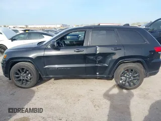2018 Jeep Grand Cherokee Laredo E with VIN 1C4RJEAG4JC311699, listed as a IAAI auction lot 41876920 with 42,584 mi miles and . Bid and sale history available at DreamBid. Image 14.