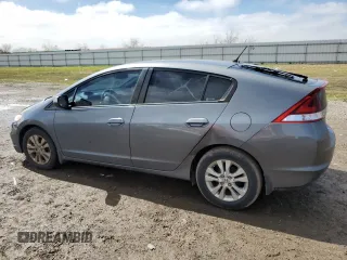 2012 Honda Insight EX z VIN JHMZE2H76CS002087, wystawiony jako Copart lot #46534815 z przebiegiem 165 422 mil mil oraz Czysty tytuł • Clean title. Historia ofert i sprzedaży dostępna na DreamBid. Obrazek 2.