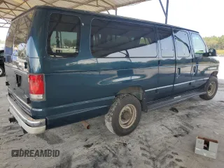 1998 Ford Econoline Wagon XL z VIN 1FBSS31S7WHB00261, wystawiony jako Copart lot #71019534 z przebiegiem 230 030 mil mil oraz Szkody całkowita. Historia ofert i sprzedaży dostępna na DreamBid. Obrazek 3.