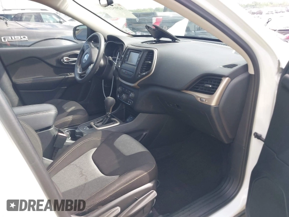2016 Jeep Cherokee Altitude with VIN 1C4PJLAB4GW290666, listed as a IAAI auction lot 42052140 with 77,116 mi miles. Bid and sale history available at carsss.com. Image 5.