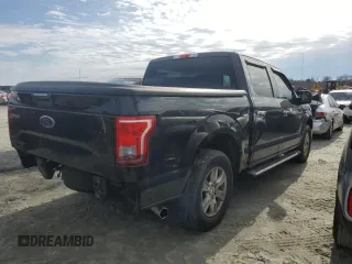 2015 Ford F-150 XL with VIN 1FTEW1CP7FFC11124, listed as a Copart auction lot 41777125 with 105,215 mi miles and Salvage title. Bid and sale history available at DreamBid. Image 3.