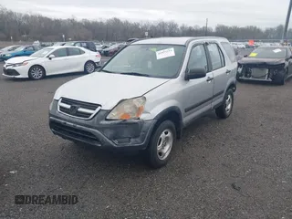 2003 Honda CR-V LX with VIN JHLRD685X3C005548, listed as a IAAI auction lot 41955514 with 206,661 mi miles and . Bid and sale history available at DreamBid. Image 2.
