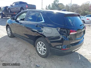 2023 Chevrolet Equinox LT with VIN 3GNAXUEG0PL213791, listed as a IAAI auction lot 41612069 with 11,580 mi miles. Bid and sale history available at carsss.com. Image 3.
