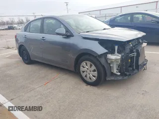 2019 Kia Rio S with VIN 3KPA24AB8KE171790, listed as a IAAI auction lot 40956966 with 103,259 mi miles. Bid and sale history available at carsss.com. Image 1.