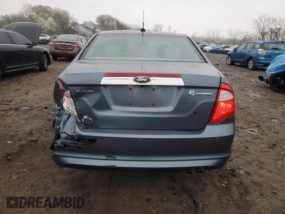 2012 Ford Fusion Hybrid z VIN 3FADP0L35CR425873, wystawiony jako Copart lot #50870905 z przebiegiem 75 133 mil mil oraz Szkoda całkowita • Salvage title. Historia ofert i sprzedaży dostępna na DreamBid. Obrazek 6.