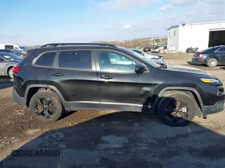 2016 Jeep Cherokee Latitude with VIN 1C4PJMCB1GW153316, listed as a IAAI auction lot 41430871 with 107,684 mi miles and . Bid and sale history available at carsss.com. Image 14.