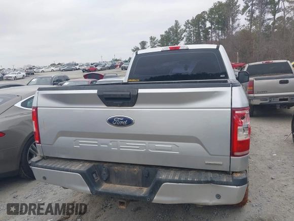 2018 Ford F-150 XL with VIN 1FTMF1EP2JFA46360, listed as a IAAI auction lot 41512148 with 107,667 mi miles. Bid and sale history available at carsss.com. Image 16.