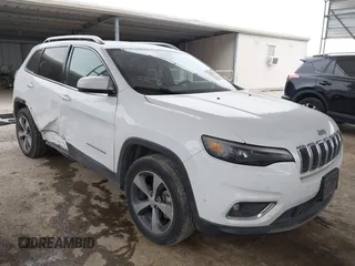 2019 Jeep Cherokee Limited z VIN 1C4PJMDX1KD197833, wystawiony jako IAAI lot #42027945 z przebiegiem 153 053 mil mil oraz . Historia ofert i sprzedaży dostępna na DreamBid. Obrazek 1.