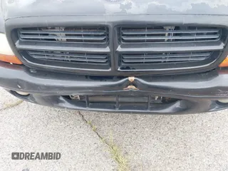 1999 Dodge Durango z VIN 1B4HS28Y2XF601465, wystawiony jako IAAI lot #41686754 z przebiegiem 168 550 mil mil oraz . Historia ofert i sprzedaży dostępna na DreamBid. Obrazek 6.