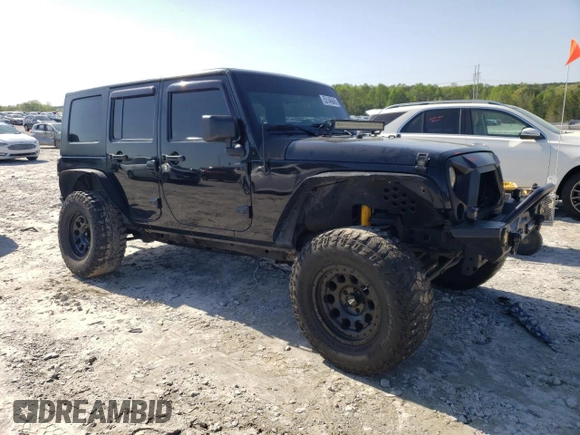 2013 Jeep Wrangler Unlimited Moab with VIN 1C4HJWEG7DL600043, listed as a Copart auction lot 52146945 with 118,882 mi miles and Salvage title. Bid and sale history available at DreamBid. Image 4.