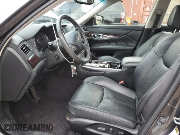 2015 Infiniti Q70 with VIN JN1BY1PR7FM830815, listed as a Copart auction lot 53296645 with 110,872 mi miles and Salvage Title. Bid and sale history available at DreamBid. Image 7.
