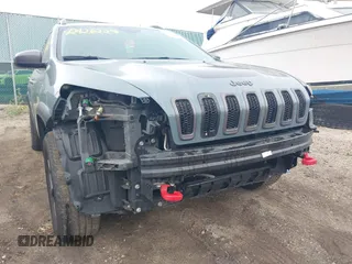 2014 Jeep Cherokee Trailhawk with VIN 1C4PJMBB5EW156315, listed as a IAAI auction lot 42426229 with 154,019 mi miles and . Bid and sale history available at DreamBid. Image 6.