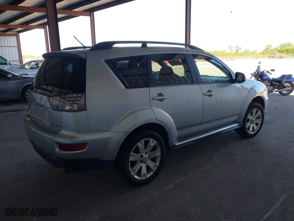 2013 Mitsubishi Outlander SE with VIN JA4JT3AW7DU012087, listed as a IAAI auction lot 41853230 with 162,824 mi miles. Bid and sale history available at carsss.com. Image 4.