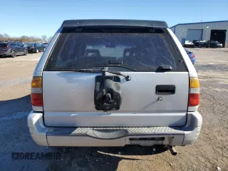 1999 Isuzu Rodeo S with VIN 4S2CK58WXX4373485, listed as a Copart auction lot 87804995 with 246,518 mi miles and Salvage title. Bid and sale history available at DreamBid. Image 6.