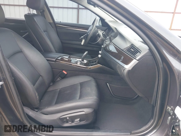 2014 BMW 5 Series 528i xDrive with VIN WBA5A7C55ED617099, listed as a IAAI auction lot 42003348 with 85,262 mi miles and . Bid and sale history available at DreamBid. Image 5.