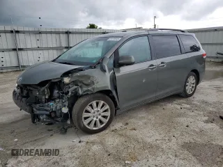 2011 Toyota Sienna XLE AAS z VIN 5TDYK3DC9BS120799, wystawiony jako Copart lot #61470045 z przebiegiem 194 422 mil mil oraz Szkoda całkowita • Salvage title. Historia ofert i sprzedaży dostępna na DreamBid. Obrazek 1.