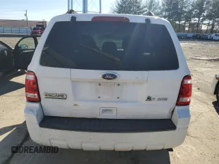 2010 Ford Escape Hybrid z VIN 1FMCU5K36AKD07129, wystawiony jako Copart lot #43914265 z przebiegiem 198 624 mil mil oraz Czysty tytuł • Clean title. Historia ofert i sprzedaży dostępna na DreamBid. Obrazek 6.
