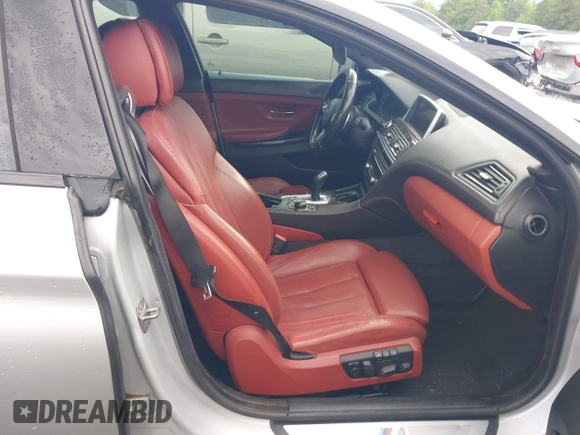 2014 BMW 6 Series 650i z VIN WBA6B2C58ED129639, wystawiony jako IAAI lot #42171786 z przebiegiem 108 677 mil mil oraz . Historia ofert i sprzedaży dostępna na DreamBid. Obrazek 5.