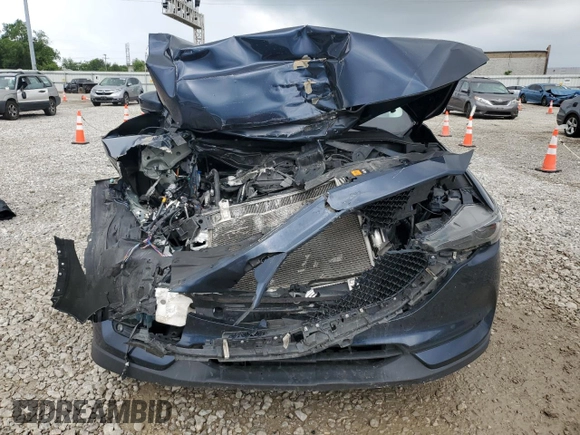 2019 Mazda CX-5 Grand Touring with VIN JM3KFBDM4K0676946, listed as a Copart auction lot 61040465 with Not provided miles and Salvage title. Bid and sale history available at DreamBid. Image 5.