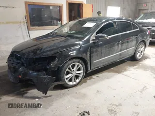 2009 Volkswagen CC Luxury z VIN WVWHL73C09E515699, wystawiony jako IAAI lot #41596349 z przebiegiem 143 570 mil mil oraz . Historia ofert i sprzedaży dostępna na DreamBid. Obrazek 18.