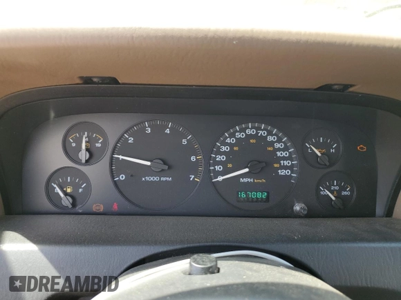 2002 Jeep Grand Cherokee Laredo z VIN 1J4GX48SX2C292081, wystawiony jako Copart lot #54246255 z przebiegiem 167 082 mil mil oraz Szkoda całkowita • Salvage title. Historia ofert i sprzedaży dostępna na DreamBid. Obrazek 9.