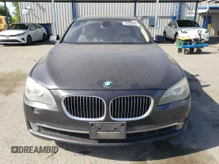 2012 BMW 7 Series 740i with VIN WBAKA4C54CC613419, listed as a Copart auction lot 54420885 with 104,006 mi miles and Salvage Title. Bid and sale history available at carsss.com. Image 5.