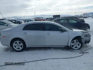 2012 Chevrolet Malibu 1LS with VIN 1G1ZB5E04CF298036, listed as a IAAI auction lot 41537790 with 127,632 mi miles and . Bid and sale history available at DreamBid. Image 14.