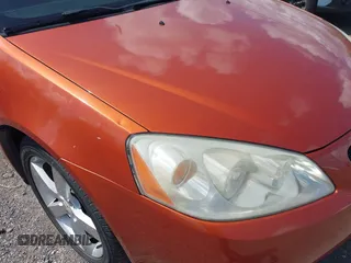 2006 Pontiac G6 GTP z VIN 1G2ZM551364171972, wystawiony jako IAAI lot #42269414 z przebiegiem 219 580 mil mil oraz . Historia ofert i sprzedaży dostępna na DreamBid. Obrazek 6.