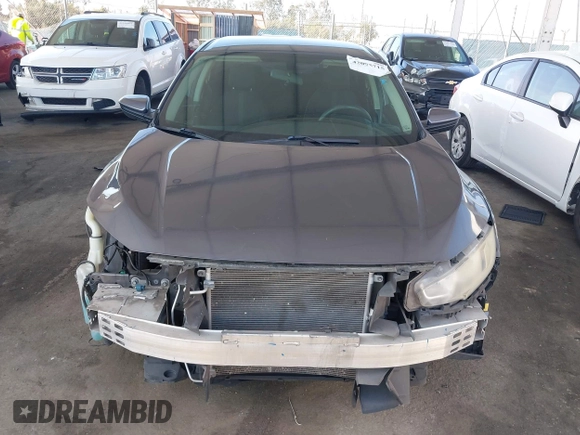 2017 Honda Civic LX z VIN 2HGFC2F53HH538362, wystawiony jako IAAI lot #42095715 z przebiegiem 156 799 mil mil oraz . Historia ofert i sprzedaży dostępna na DreamBid. Obrazek 13.