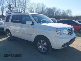 2015 Honda Pilot Touring with VIN 5FNYF3H97FB023842, listed as a IAAI auction lot 41673881 with 106,110 mi miles. Bid and sale history available at carsss.com. Image 1.