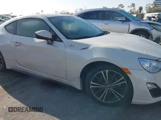 2016 Scion FR-S with VIN JF1ZNAA17G9707484, listed as a IAAI auction lot 41857022 with 53,431 mi miles. Bid and sale history available at carsss.com. Image 6.