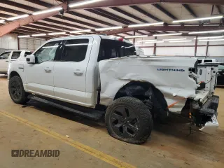 2023 Ford F-150 Lightning Pro with VIN 1FTVW1EL1PWG05889, listed as a Copart auction lot 48022435 with 20,904 mi miles and Salvage Title. Bid and sale history available at DreamBid. Image 2.